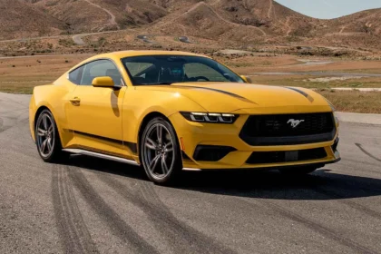 Yellow sports car on a winding road