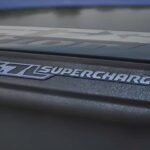 Close-up of the supercharged badge on the 2027 Ram Rumble Bee supercharger housing